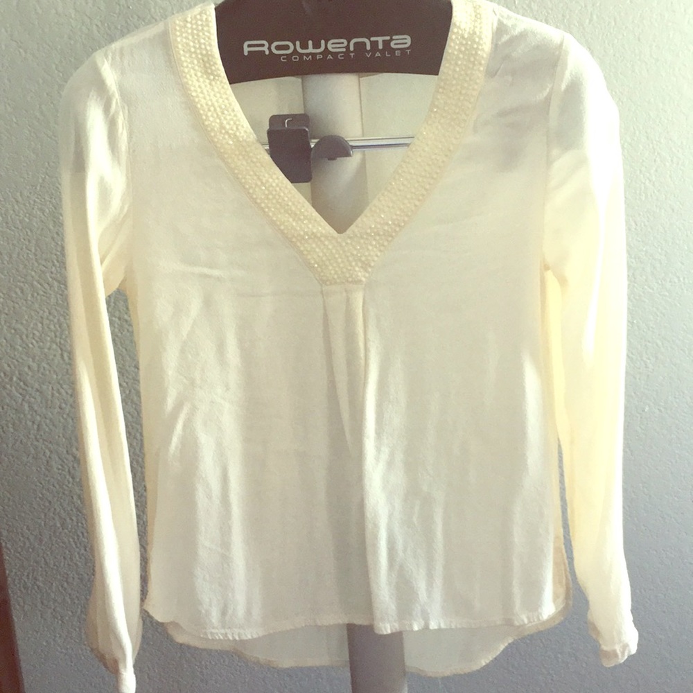 Ivory long sleeve shirt with sparkly studs